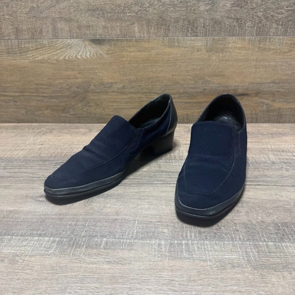 The Rangoni Firenze Navy Textile Block Heels Loafers are a stylish and comfortab